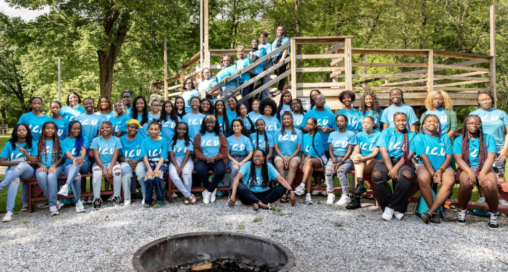 Group of teenage girls in matching ICU shirts